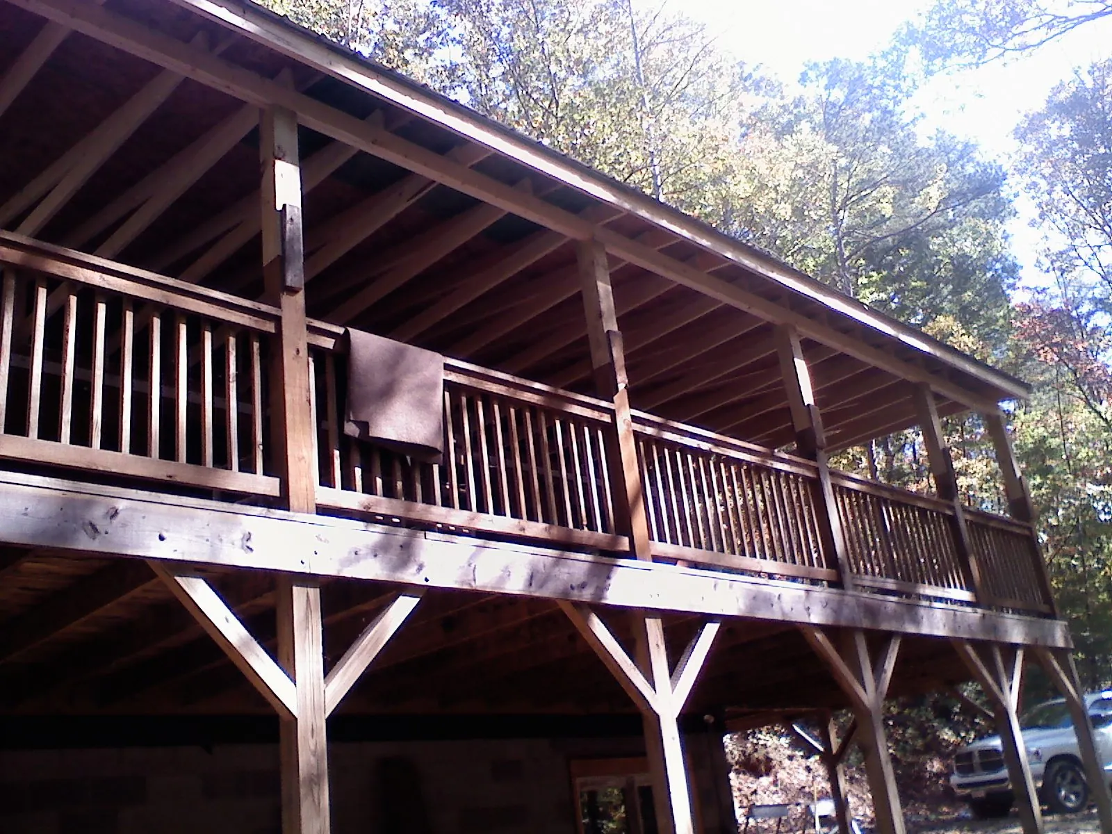 Timber framing under a new elevated porch and deck — Roof Leak Repair in Harrisonburg by Roofing Brothers